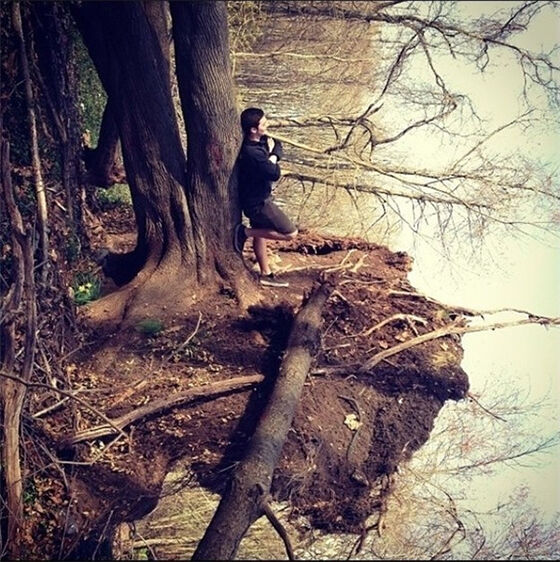 Is this man standing in a lake or in ...